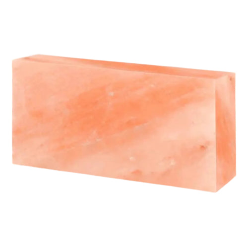Rectangular pink salt block on a white background